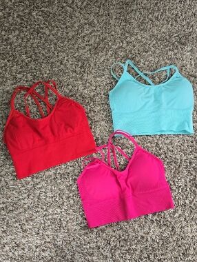 NVGTN 3-Pack Strappy Seamless Bralettes - Red, Aqua, Hot Pink